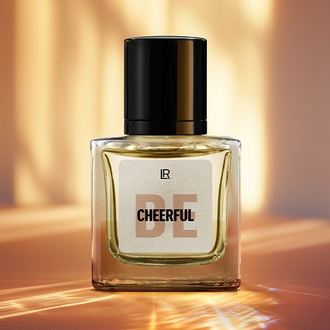 Bouteille du parfum LR BE CHEERFUL, un parfum floriental-épicé pour femme, qui évoque la fraîcheur et la joie. Disponible sur produit-lr.fr  